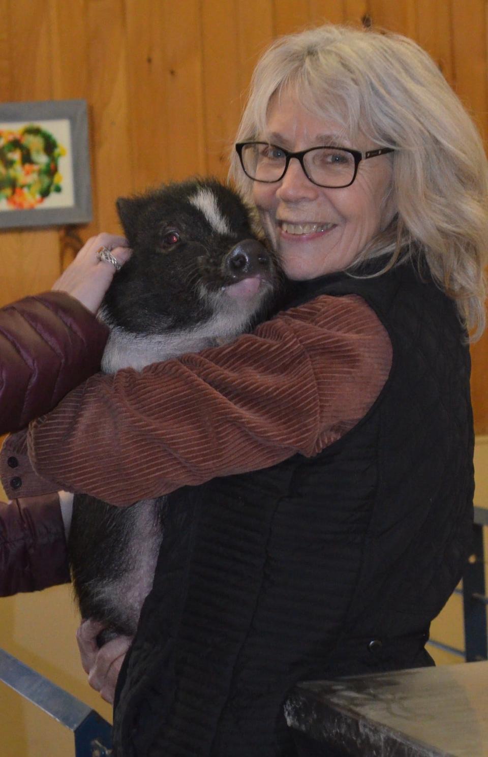 For 33 years, Susan Magidson, founder of Ross Mill Farms' Pig Placement Network, has been rehabilitating and rehoming pot-bellied pigs. Pigs, she said, are as smart as toddlers. Make sure to adopt the pig that's just right for you, said Magidson.