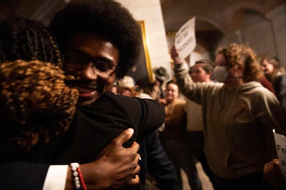 Democratic Reps. Justin Pearson of Memphis is embraced by a supporter after protesters gather on the floor below the House chambers following a session where it was announced Republicans began the process of expelling Democratic Reps. Justin Pearson of Memphis, Rep. Justin Jones of Nashville, and Rep. Gloria Johnson of Knoxville, at Tennessee state Capitol Building in Nashville , Tenn., Monday, April 3, 2023. 