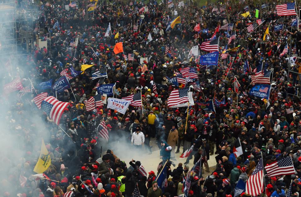 Trump supporters clash with police and security forces as they storm the Capitol on Jan. 6, 2021.