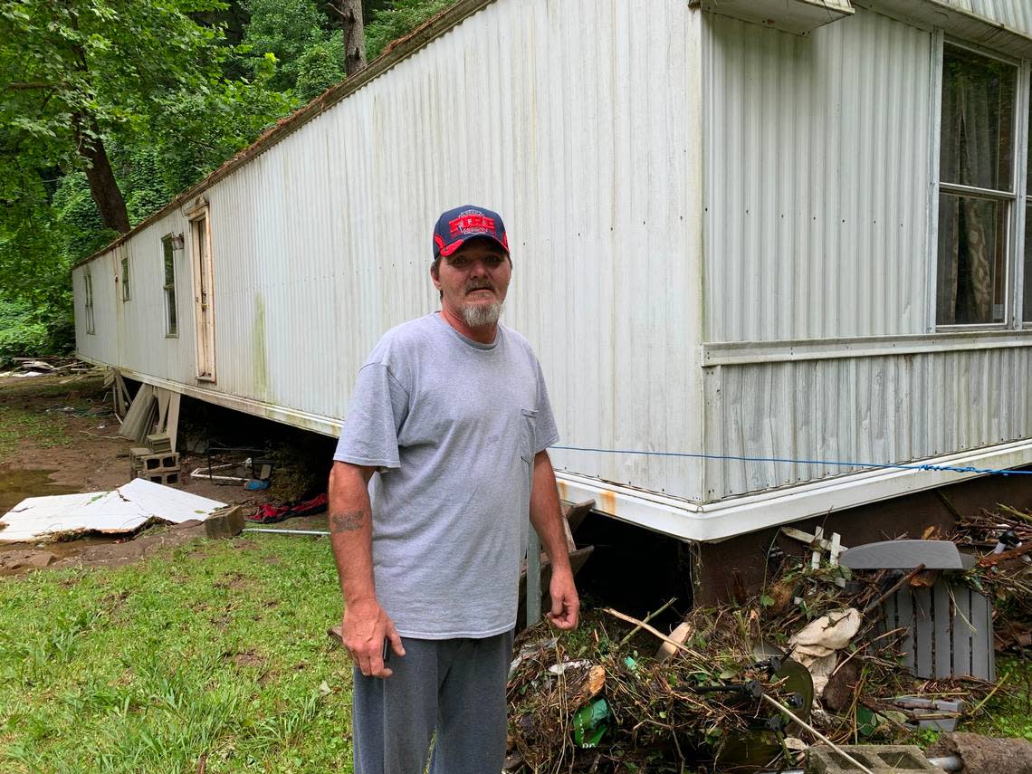 “It’s probably one of the peacefullest places you could live,” Pence said, standing in front of his flood-wrecked trailer inthe Perry County community of Dwarf.
