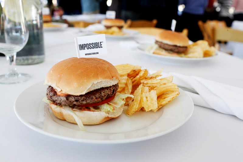 The completed plant-based hamburger is displayed during a media tour of Impossible Foods labs and processing plant in Redwood City, California