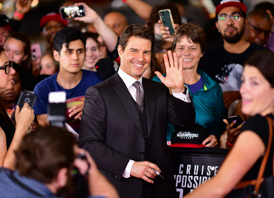 Tom Cruise, posing as a mere mortal at the "Mission: Impossible - Fallout" premiere. (Photo: James Devaney via Getty Images)