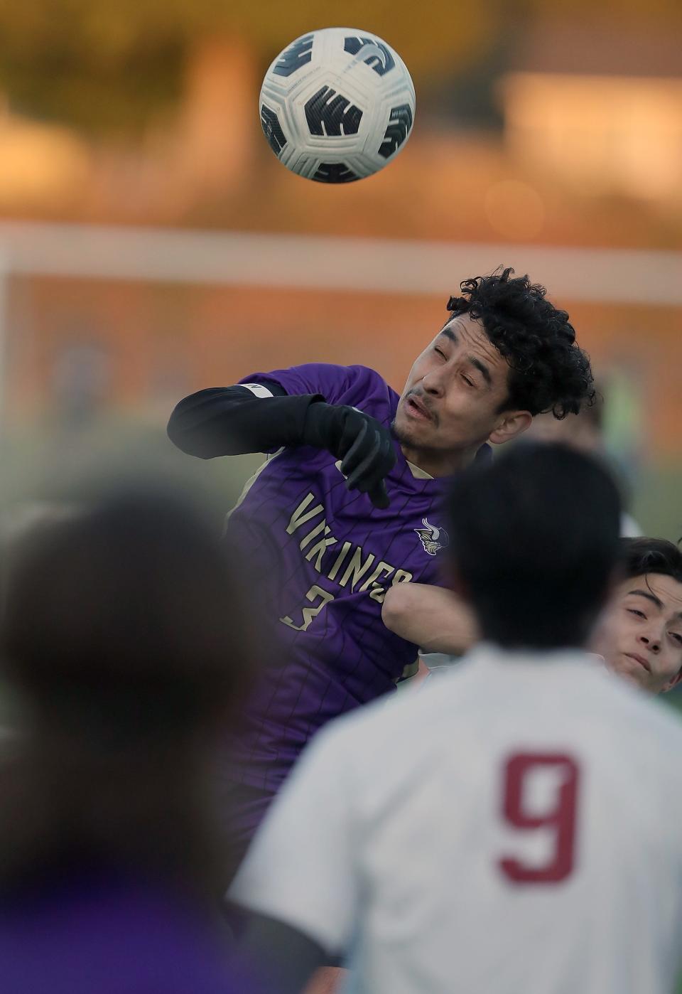 North Kitsap’s Jerardo Larios goes up for a header during their 11-0 win over Kingston on Tuesday, March 21, 2023. The Vikings improved to 2-1-1 overall with the win while the Buccaneers fell to 2-2-0 with the loss.