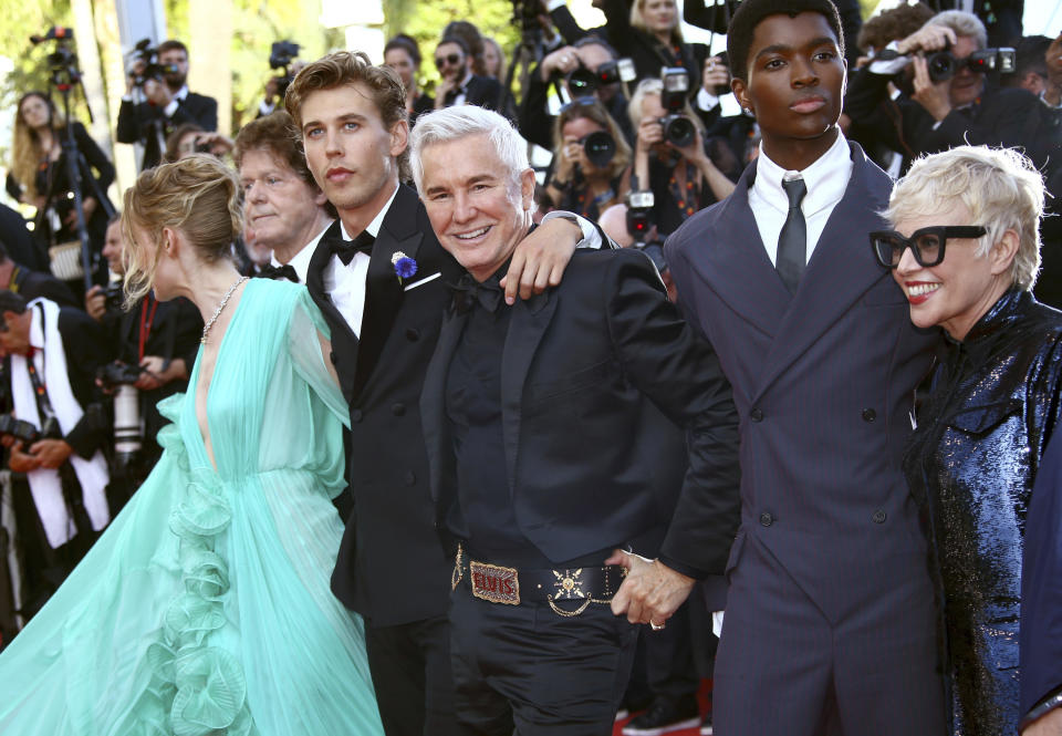 Olivia DeJonge, from left, Jerry Schilling, Austin Butler, director Baz Luhrmann, Alton Mason, and Catherine Martin pose for photographers upon arrival at the premiere of the film 'Elvis' at the 75th international film festival, Cannes, southern France, Wednesday, May 25, 2022. (Photo by Joel C Ryan/Invision/AP)