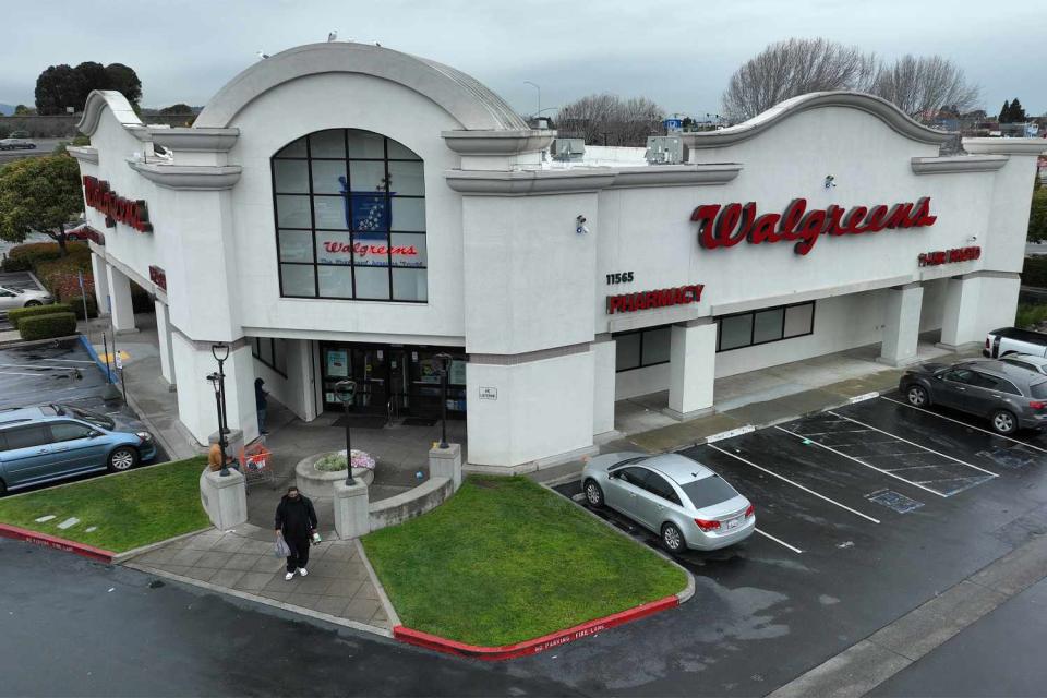 <p>Justin Sullivan/Getty</p> An aerial view of a Walgreens store in El Cerrito, California. 