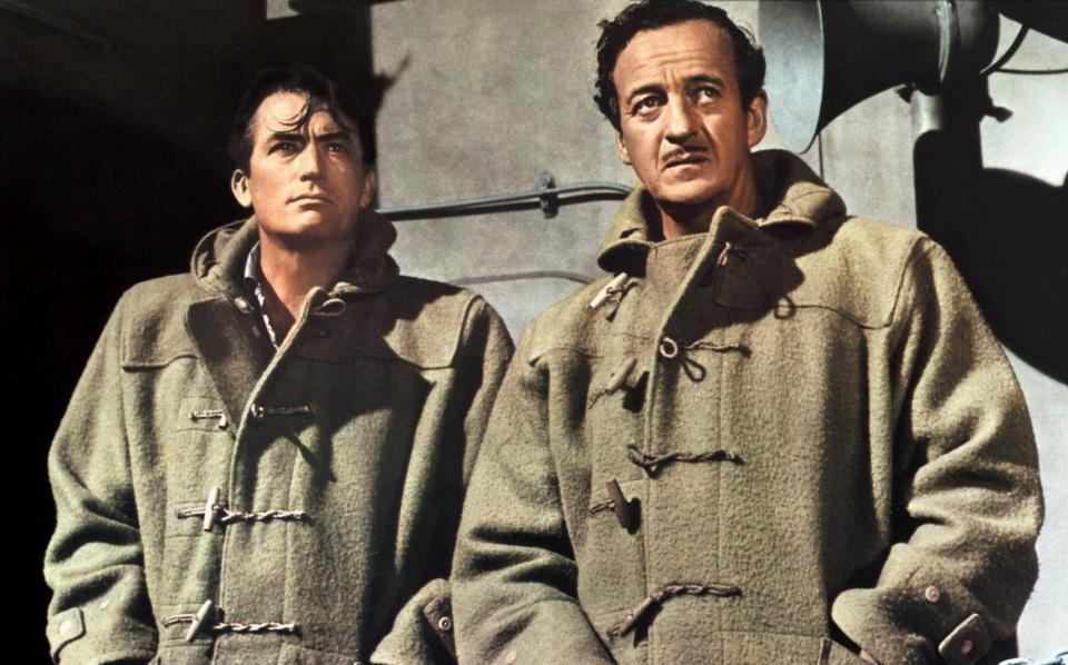 Gregory Peck (left) and David Niven star in The Guns of Navarone - Alamy