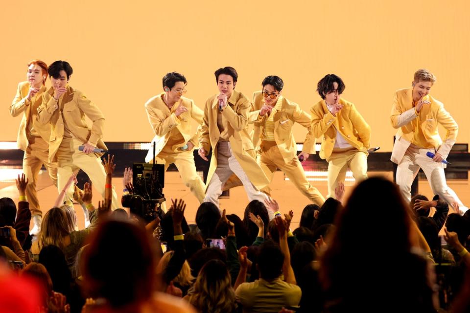 Suga, V, J-Hope, Jin, Jungkook, Jimin and RM of BTS perform during the 2021 American Music Awards at Microsoft Theater in Los Angeles (Getty)