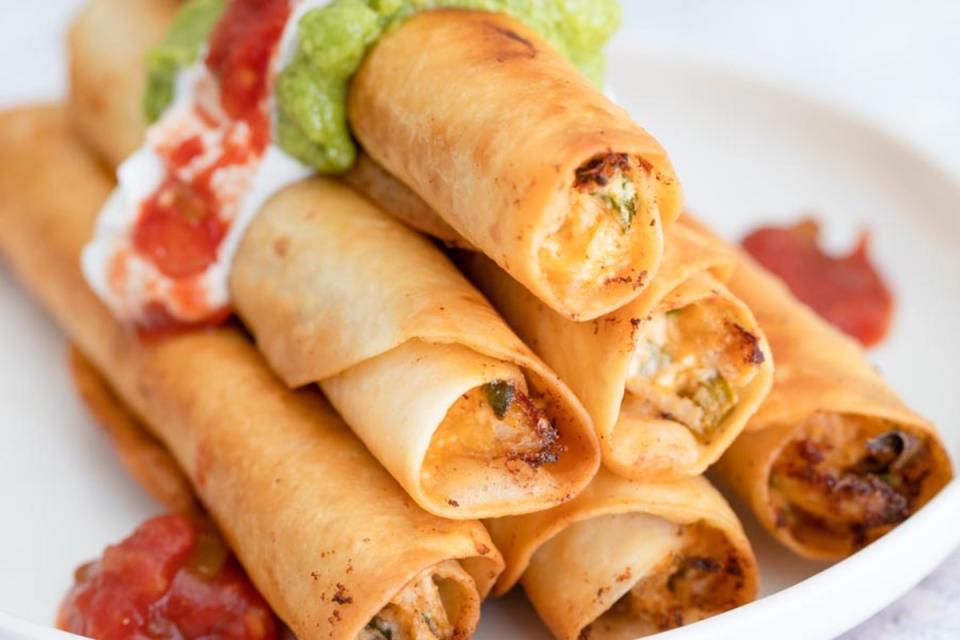 <p>Keto Focus</p><p>A delicious way to use up leftover chicken or a deli rotisserie chicken. Shredded chicken is combined with a creamy cheese mixture, wrapped in a low-carb tortilla and fried to crispy perfection.</p><p><strong>Get the recipe:</strong><a href="https://www.ketofocus.com/recipes/keto-chicken-taquitos/" rel="nofollow noopener" target="_blank" data-ylk="slk:Keto Chicken Taquitos;elm:context_link;itc:0;sec:content-canvas" class="link "> <strong>Keto Chicken Taquitos</strong></a></p>