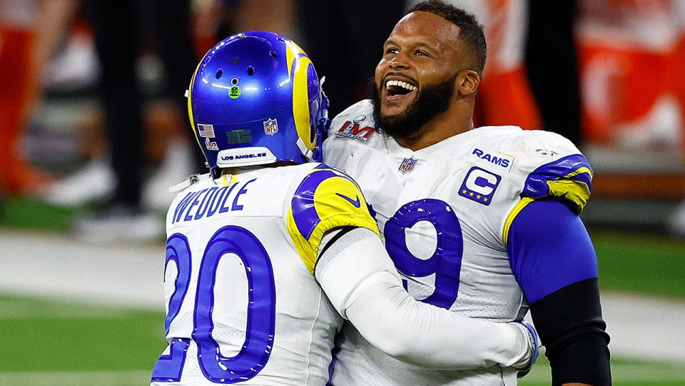 LA Rams defender Aaron Donald celebrates after defeating the Cincinnati Bengals 23-20 in the 2022 Super Bowl. (Photo by Ronald Martinez/Getty Images)