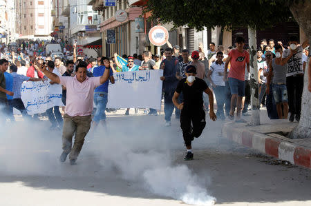 Riot police fired tear gas towards protesters during a demonstration against alleged corruption in the town of Al-Hoceima, Morocco July 20, 2017. REUTERS/Youssef Boudlal