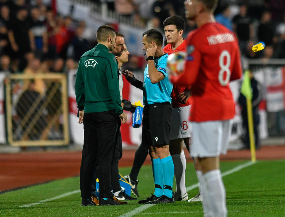 England's head coach Gareth Southgate (2nd-L) looks on during a temporary interruption of the Euro 2020 Group A football qualification match between Bulgaria and England due to incidents with fans, at the Vasil Levski National Stadium in Sofia on October 14, 2019. (Photo by NIKOLAY DOYCHINOV / AFP) (Photo by NIKOLAY DOYCHINOV/AFP via Getty Images)