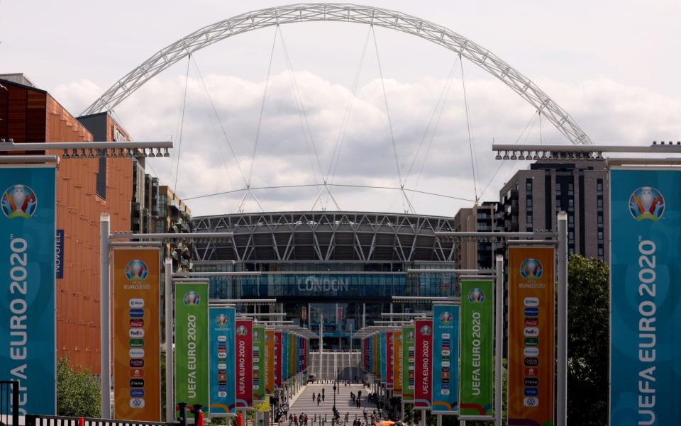 Clouds gather above the Wembley arch - PA