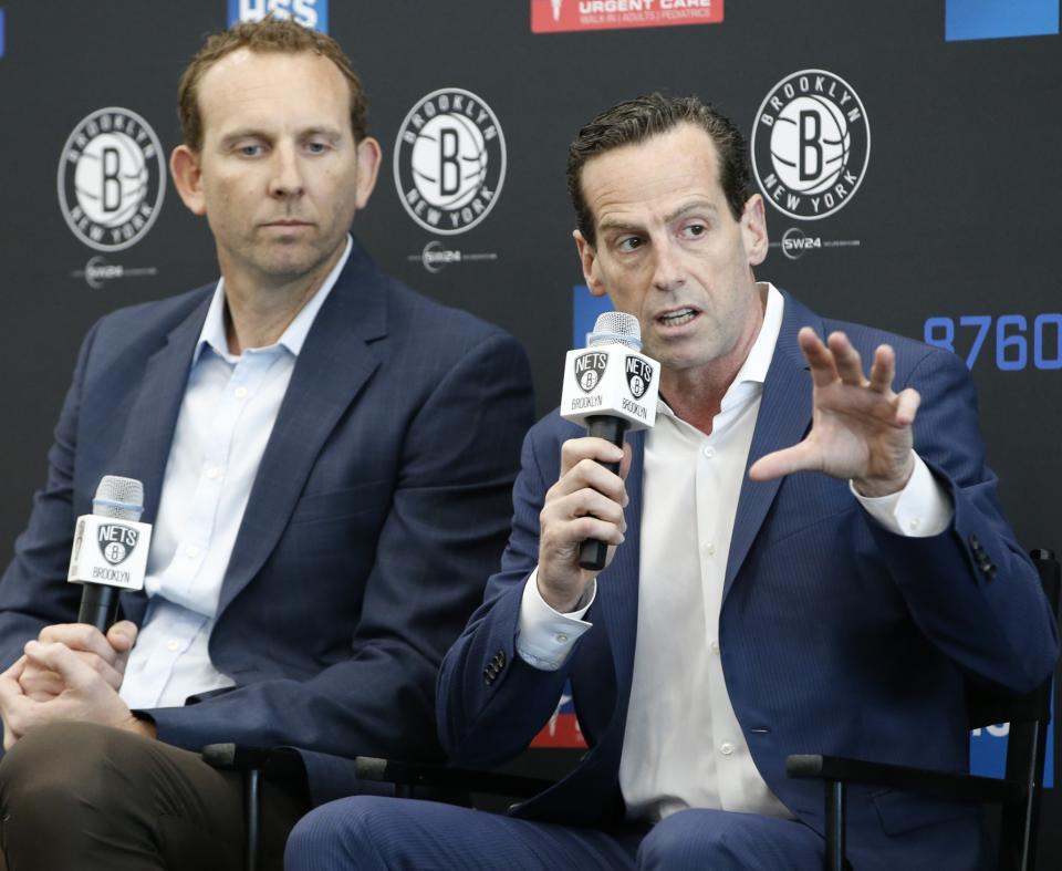 GM Sean Marks (left) and head coach Kenny Atkinson will start the Nets' rebuild in earnest this year. (AP)