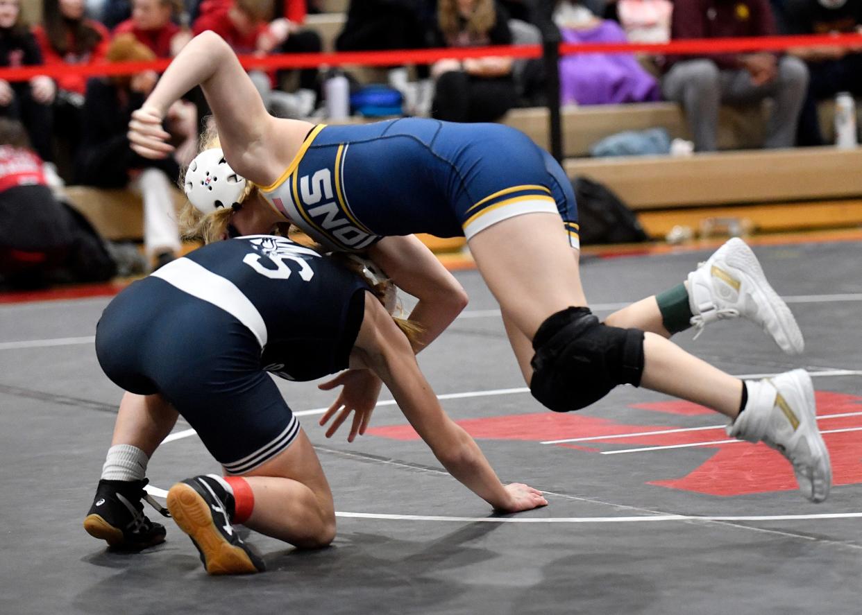 Gloucester's Jaclyn McDowell, top, defeated Middletown South's Ella Hansen 9-3 following Saturday's 100 lb. bout at the NJSIAA 2022 South Region girls' wrestling tournament held at Kingsway High School. Feb. 12, 2022.