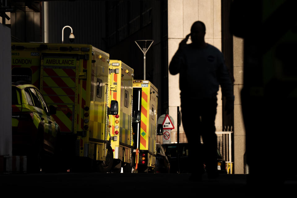 Ambulances waiting at the Royal London hospital in London, Jan. 6, 2023, as flu cases continued to rise amid a winter surge, ambulance delays, and a hospital bed shortage. / Credit: Aaron Chown/PA Images via Getty