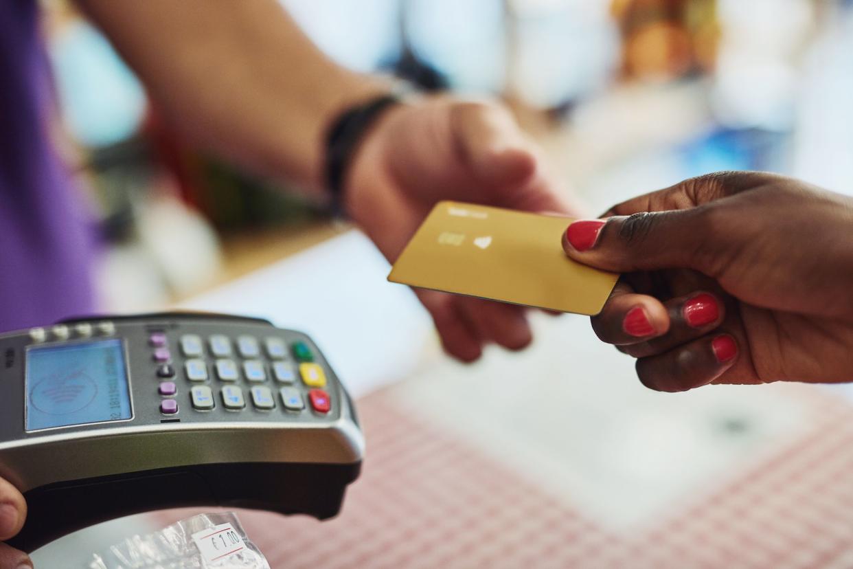 Cropped shot of an unrecognizable customer making payment in a store