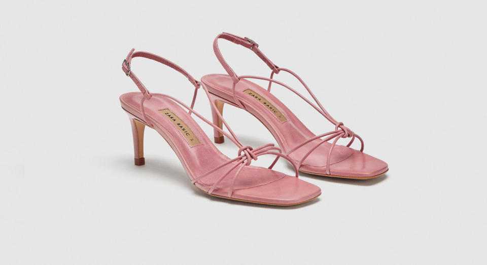 <p>These blush pink sandals from Zara look far more high-end than their price-tag, plus the strappy knot front is a style we’ve been seeing all over Instagram from the fashion set.<br><a rel="nofollow noopener" href="https://www.zara.com/uk/en/leather-strappy-high-heel-sandals-p12336301.html?v1=6618002&v2=1074660" target="_blank" data-ylk="slk:Buy here.;elm:context_link;itc:0;sec:content-canvas" class="link ">Buy here.</a> </p>