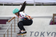 Funa Nakayama of Japan competes in the women's street skateboarding finals at the 2020 Summer Olympics, Monday, July 26, 2021, in Tokyo, Japan. (AP Photo/Ben Curtis)