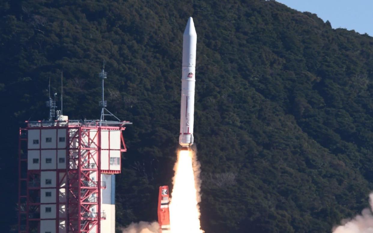 The Epsilon-4 rocket lifts off from the Uchinoura space centre by the Japan Aerospace Exploration Agency (JAXA) - AFP