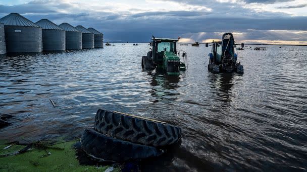 PHOTO: Ranch equipment stand in floodwaters from the reemerging Tulare Lake near Corcoran, Calif., on May 1, 2023. (Bloomberg via Getty Images)