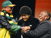 <p>Struggle icon Winnie Madikizela-Mandela with President Jacob Zuma and his deputy, Cyril Ramaphosa, during the African National Congress national policy conference on July 1, 2017, in Johannesburg, South Africa. The conference is a gathering of about 3,500 delegates from branches across the country to discuss the party’s policies. (Photo: Muntu Vilakazi/Foto24/Gallo Images/Getty Images) </p>