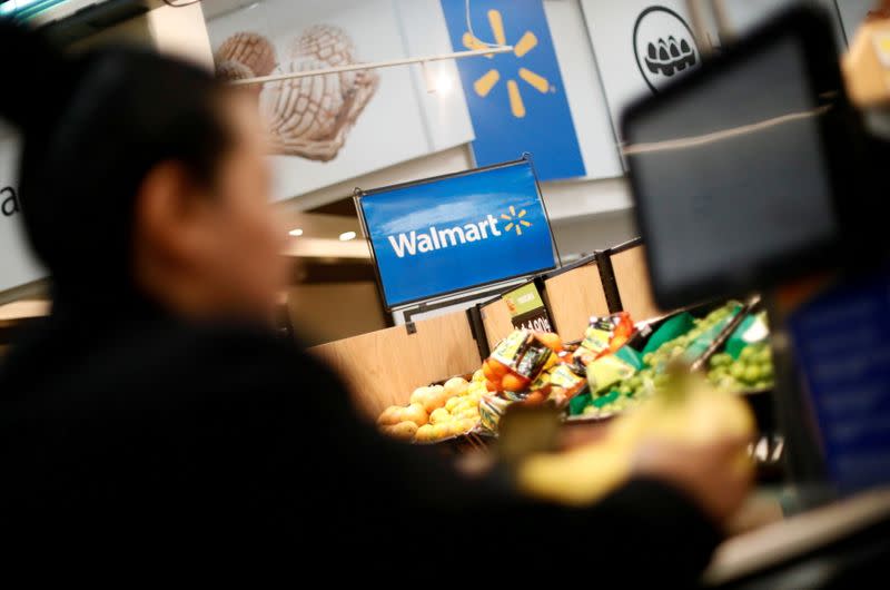 FILE PHOTO: A customer shops inside a Walmart store in Mexico City