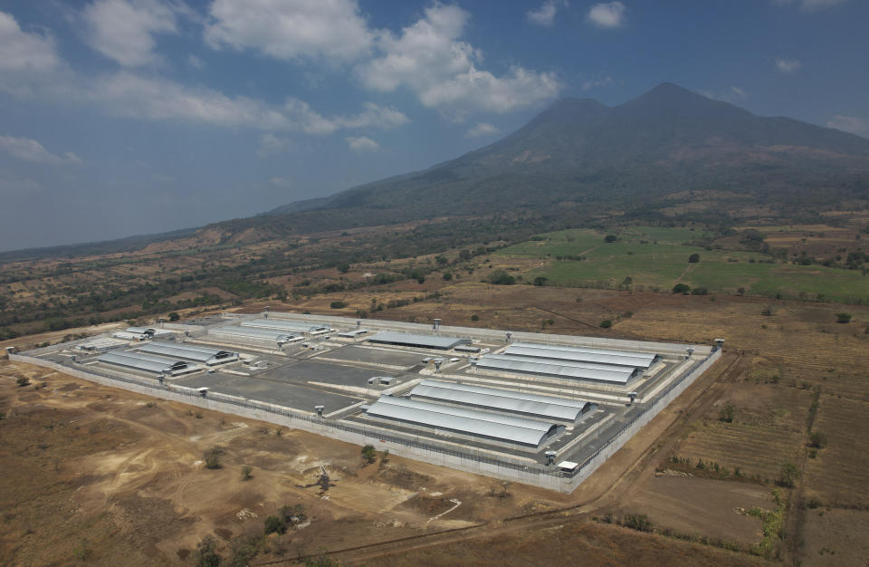 FILE - A mega-prison known as Detention Center Against Terrorism (CECOT) stands in Tecoluca, El Salvador, Sunday, March 5, 2023. As of Nov. 2023, the prison is holding some 12,000 alleged or convicted gang members, barely a fourth of its 40,000 capacity. (AP Photo/Salvador Melendez, File)