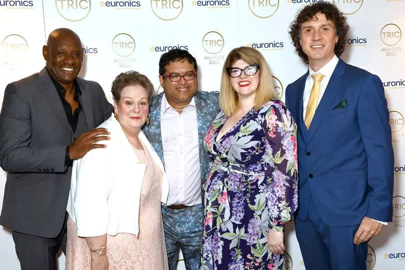 Cast members from The Chase 
Shaun Wallace, Anne Hegerty, Paul Sinha, Jenny Ryan and Darragh Ennis attend the TRIC Awards 2022 at Grosvenor House on July 06, 2022 in London, England.