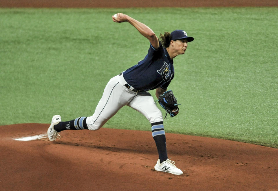 Tampa Bay Rays starter Tyler Glasnow pitches against the Texas Rangers during the first inning of a baseball game Monday, April 12, 2021, in St. Petersburg, Fla. (AP Photo/Steve Nesius)