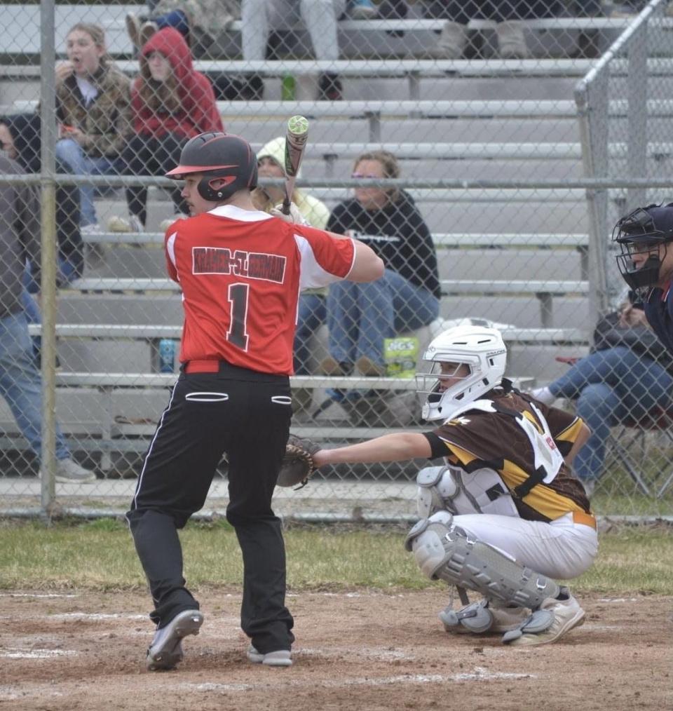 Justin Kramer (left) and the Onaway baseball team rolled to a Ski Valley sweep at Central Lake on Monday.