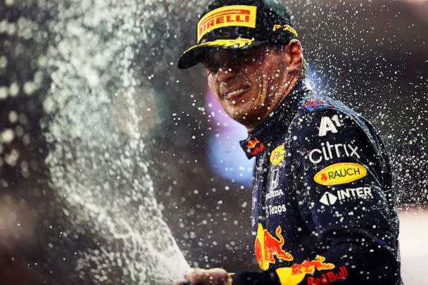 PHOTO: Max Verstappen of Oracle Red Bull Racing celebrates on the podium after winning the Formula 1 World Championship at Yas Marina Circuit on Dec. 12, 2021, in Abu Dhabi. (Dan Istitene/Formula 1 via Getty Images, FILE)