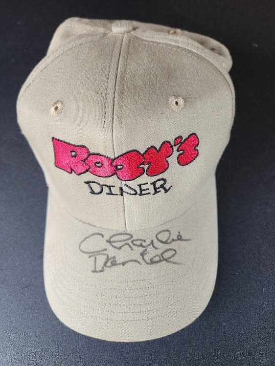In 2010, the News Sentinel hosted an 80th birthday party for cartoonist Charlie Daniel. Guests received an autographed cap that highlighted his "Rosy's Diner" editorial comic strip that ran every Sunday at the top of the Perspective section.