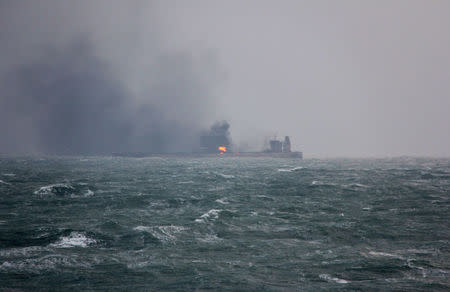 Smoke is seen from Panama-registered Sanchi tanker carrying Iranian oil that caught ablaze after it collided with a Chinese freight ship in the East China Sea. China's Ministry of Transport/via REUTERS