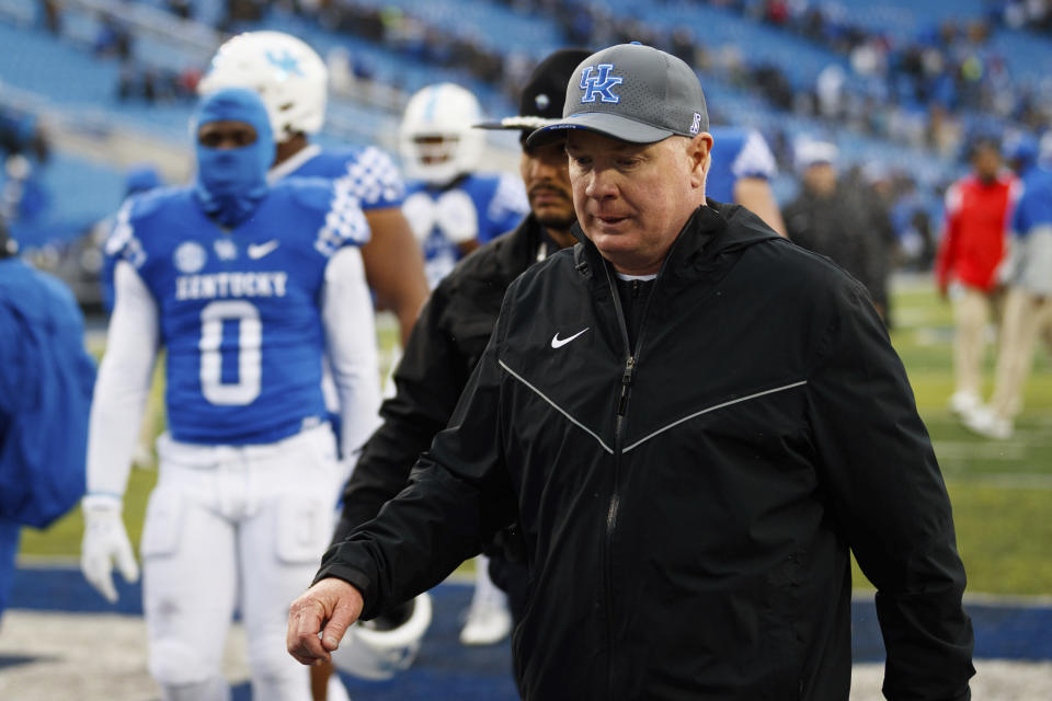 Kentucky head coach Mark Stoops walks off the field after losing to Vanderbilt in an NCAA college football game in Lexington, Ky., Saturday, Nov. 12, 2022. (AP Photo/Michael Clubb)