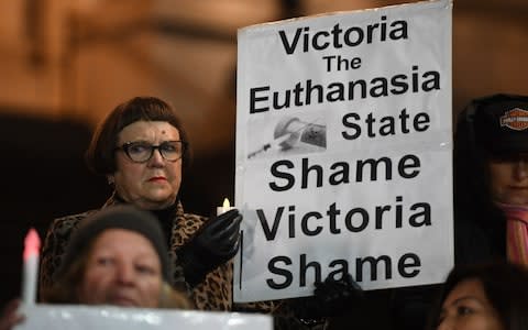 Pro-life demonstrators outside the Victorian State Parliament in Melbourne - Credit: JAMES ROSS/EPA-EFE/REX