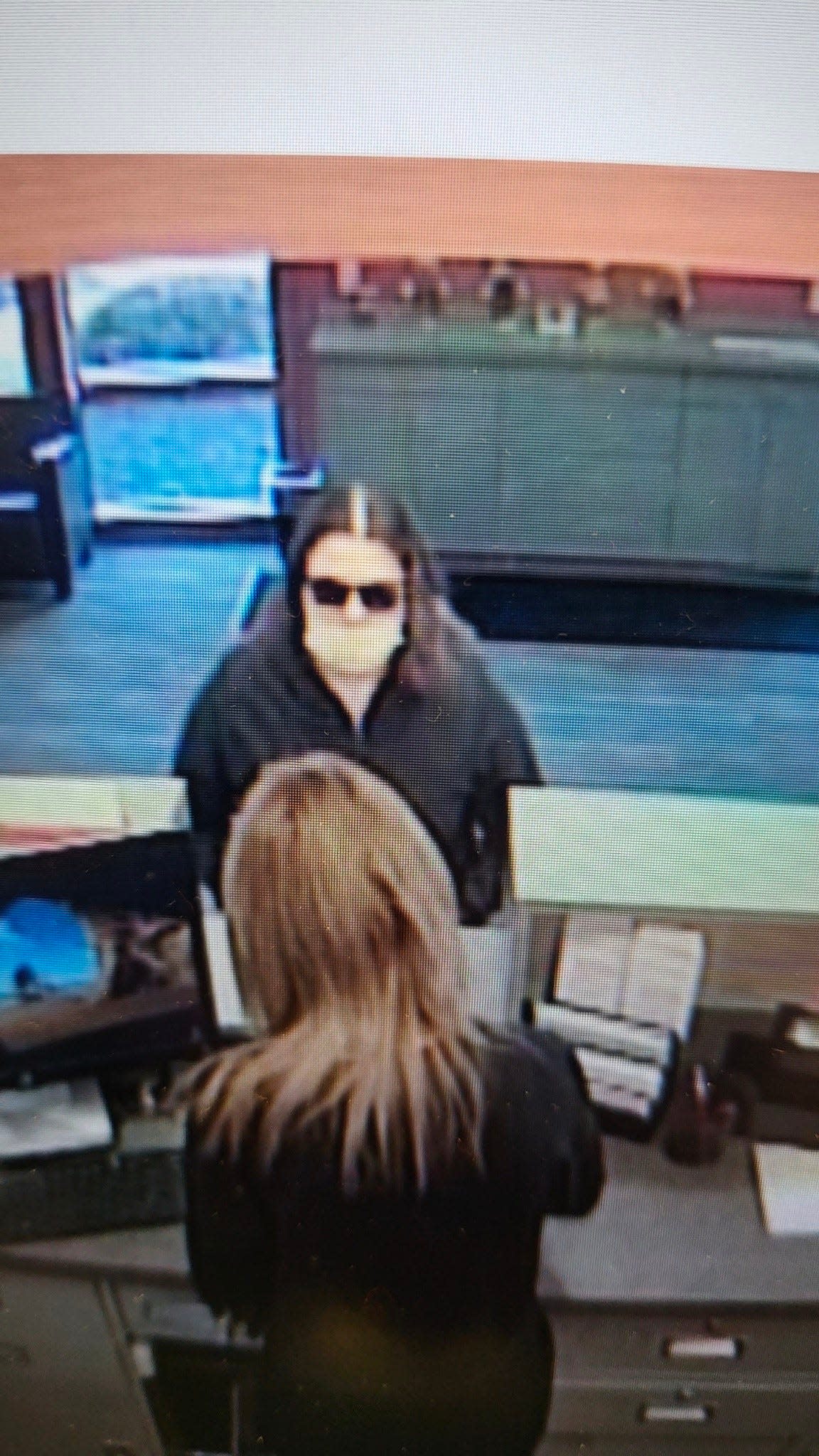 The Stark County Sheriff's Office on Thursday released this photo of a woman accused of robbing the First Commonwealth Bank at Oakwood Square in Plain Township.