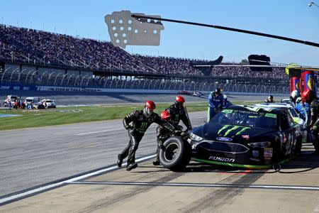 Oct 14, 2018; Talladega, AL, USA; NASCAR Cup Series driver Kurt Busch (41) makes a pit stop during the 1000Bulbs.com at Talladega Superspeedway. Mandatory Credit: Peter Casey-USA TODAY Sports