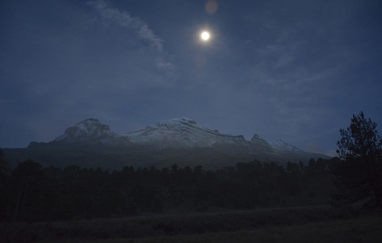 The Iztaccihuatl volcano is seen at night in Mexico State, Mexico (Isaac Gomez/INAH via AP)