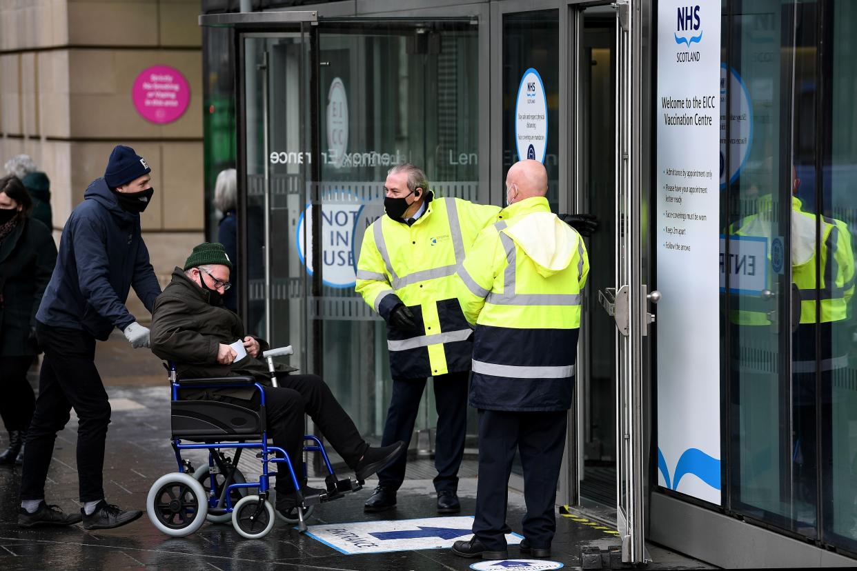 Members of the over-70s arrive at the EICC to receive their first dose of coronavirus vaccination on Feb. 1, 2021, in Edinburgh, Scotland. Mass vaccination centers, including Edinburgh International Conference Centre and Aberdeen’s P&J; LIVE at TECA, opened today as the vaccination program moves to the next stage.