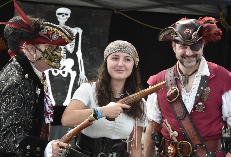 Dress like a pirate, contestant Kader Blaney, center, poses with Gregory Young, left, and Tom Vigneau on the first day of the 2021 Pirate Festival. Steve Heaslip/Cape Cod Times