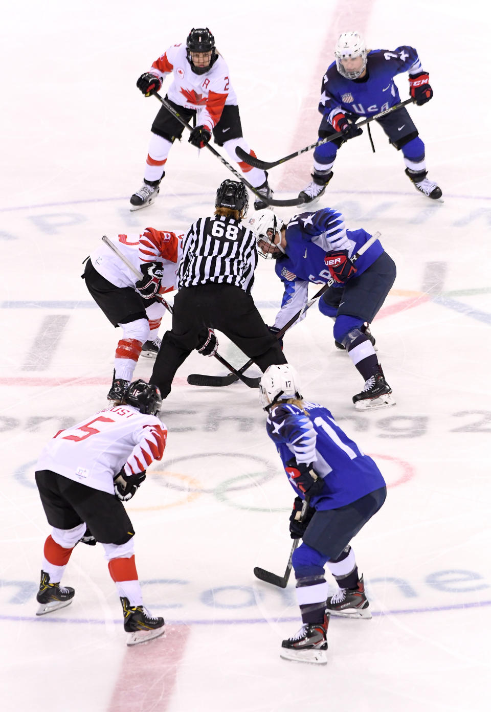<p>Marie-Philip Poulin #29 of Canada faces off against Kelly Pannek #12 of the United States in the third period during the Women’s Gold Medal Game on day thirteen of the PyeongChang 2018 Winter Olympic Games at Gangneung Hockey Centre on February 22, 2018 in Gangneung, South Korea. (Photo by Harry How/Getty Images) </p>