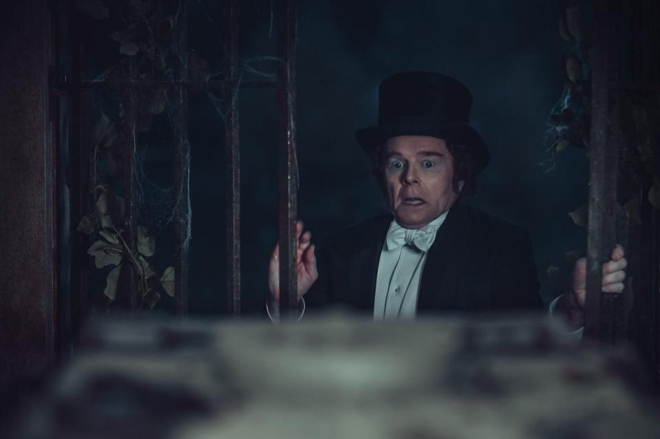 Jason Watkins cowers in fear from a crypt in the Ghost Story for Christmas, "Count Magnus."