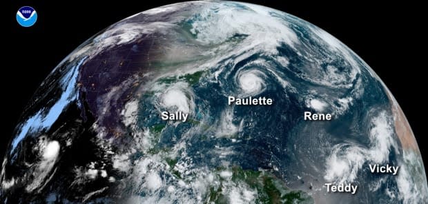 This satellite image shows five hurricanes churning across the Atlantic Ocean in 2020. The 2020 Atlantic hurricane season went down in history for the most named storms observed in a year (30); the most storms to make landfall in the continental United States (12); the most to hit Louisiana (5); and the most storms to form in September (10).