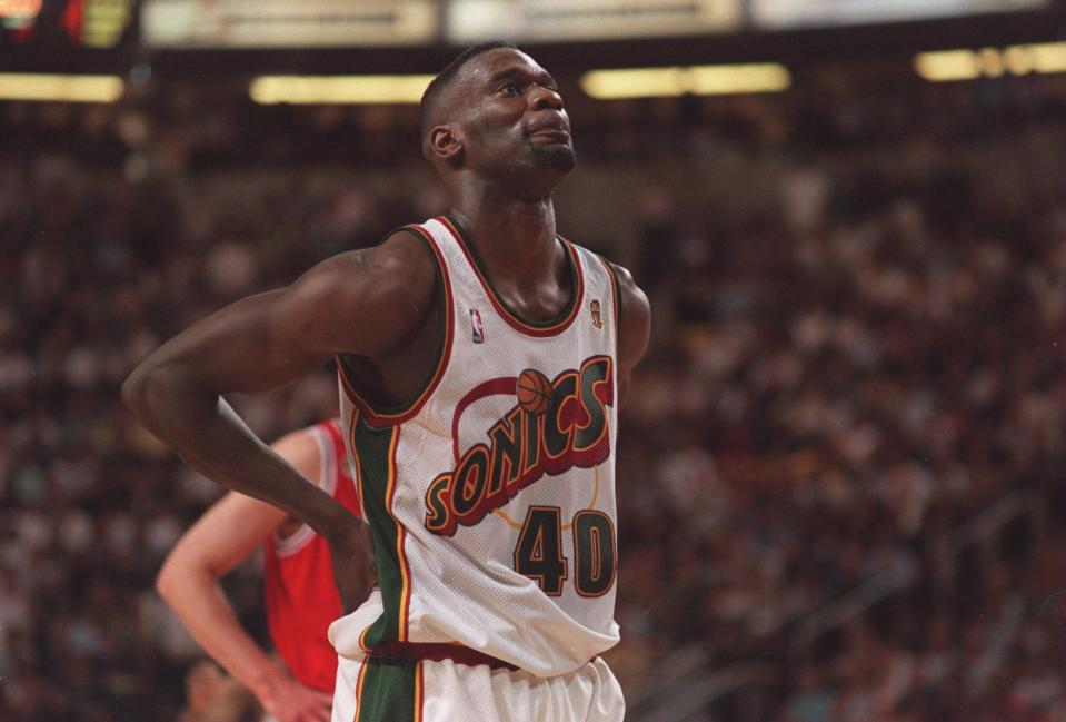 12 Jun 1996:  Forward Shawn Kemp of the Seattle Supersonics gazes up at the score board as he takes an opportunity to catch his breath between plays during the Sonics 107-86 victory over the Chicago Bulls in the NBA Championship Finals at the Key Arena in