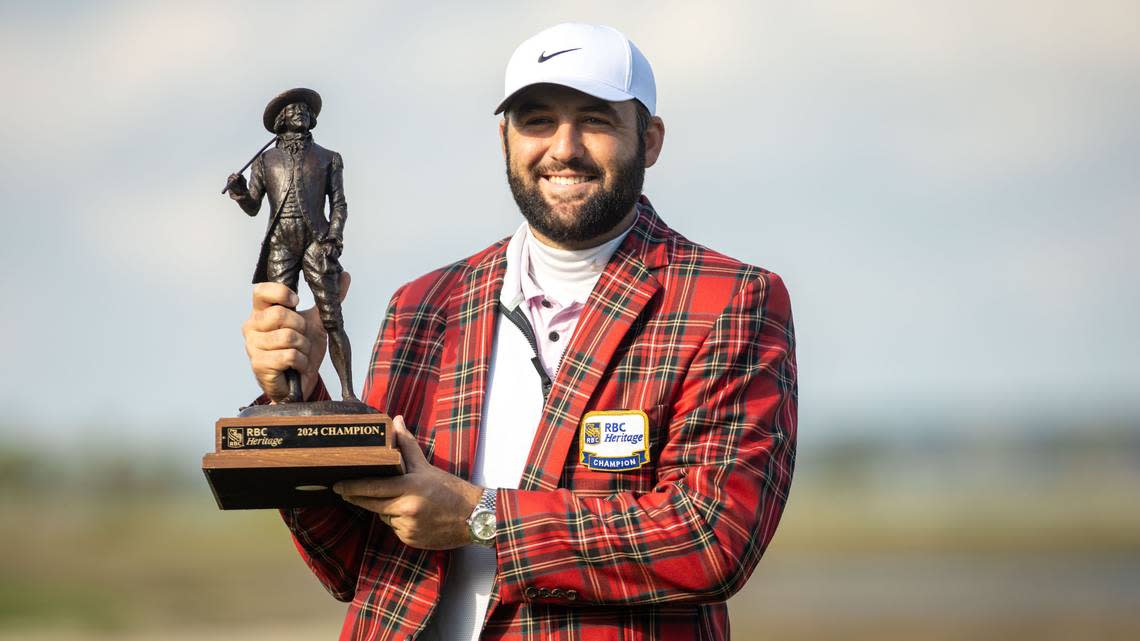 Scottie Scheffler presents his newly won Sir William Innes trophy after a rain delay pushed the final round of the RBC Heritage Presented by Boeing at Harbour Town Golf Links to Monday, April 22, 2024 in Sea Pines on Hilton Head Island.