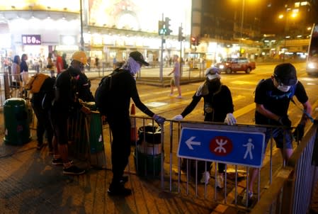 Anti-extradition bill protesters set up a roadblock at Tsim Sha Tsui neighborhood in Hong Kong
