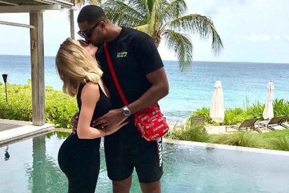 Loved up: Khloe Kardashian and Tristan Thompson share a kiss(@khloekardashian)