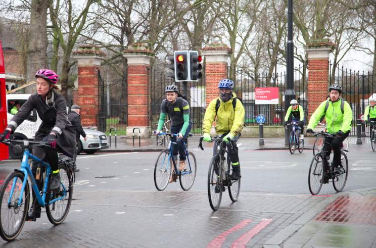 Cycling to work can lower the risk of developing cancer and heart disease (Rex)