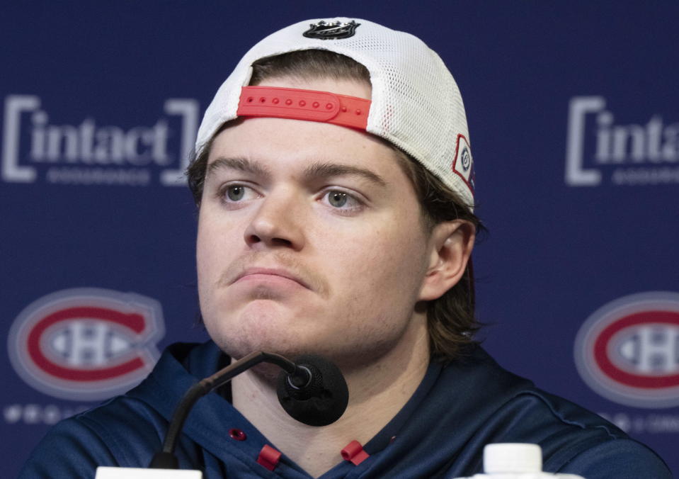 Montreal Canadiens NHL hockey forward Cole Caufield speaks to the media about his season-ending shoulder injury Friday, Jan. 27, 2023, in Montreal. (Ryan Remiorz/The Canadian Press via AP)