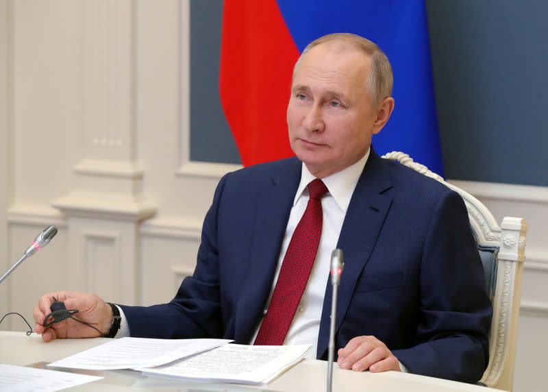 FILE PHOTO: Russia's President Putin attends a video conference during the World Economic Forum (WEF) of the Davos Agenda, in Moscow